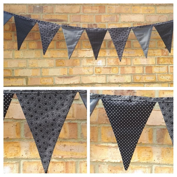 Bunting in black polkadot, black circles and grey fabric.
