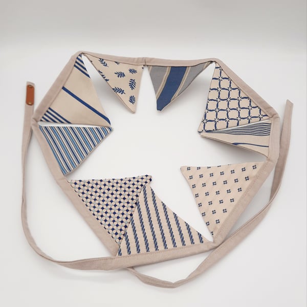 Mini bunting in cream and blue contrasting fabrics.