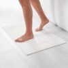 Amazon Basics Non-Slip Cotton Bath Mat, 100% Cotton Absorbent, Machine Washable, 31" L x 20" W, Bright White
